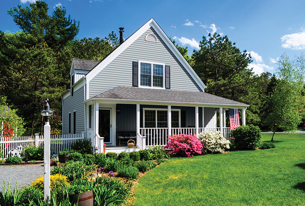 gray house manicured yard