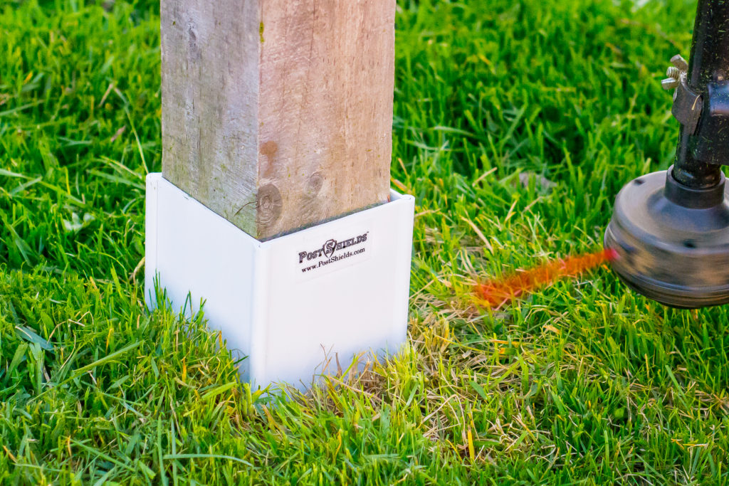 wooden post with base shield