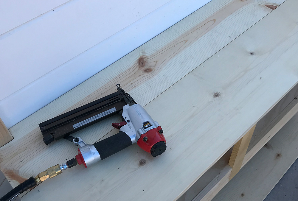 nail gun on bench