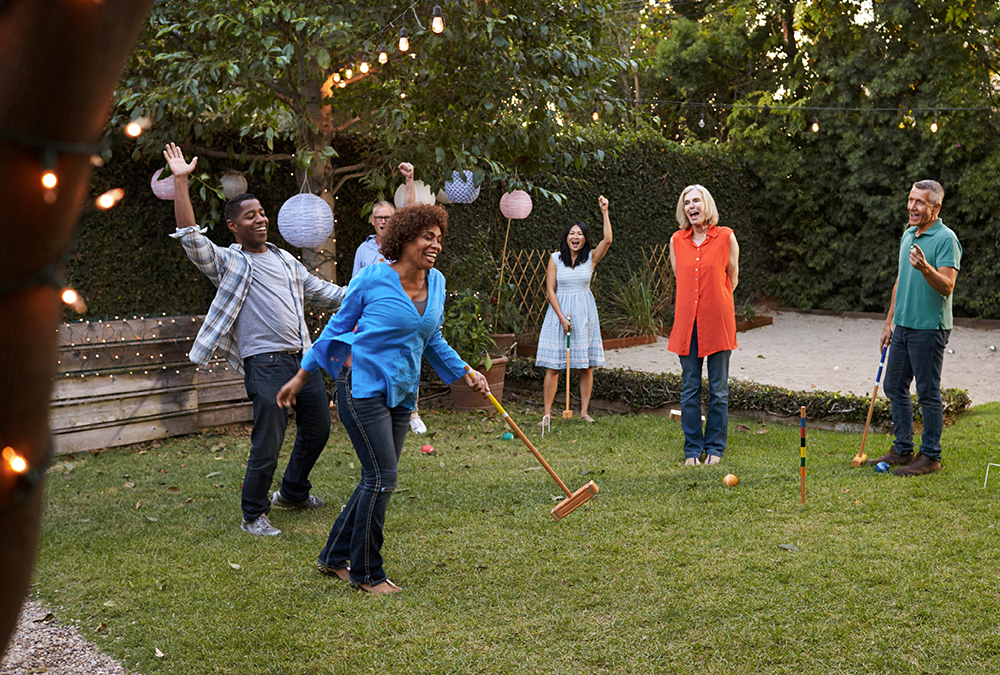 people playing croquet