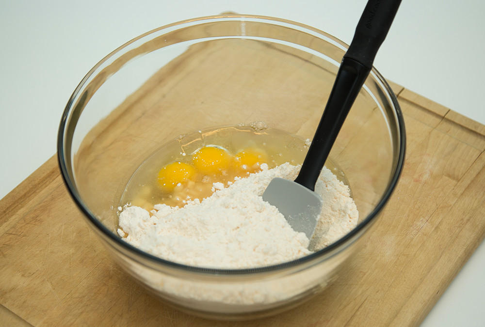cake mix and eggs in bowl