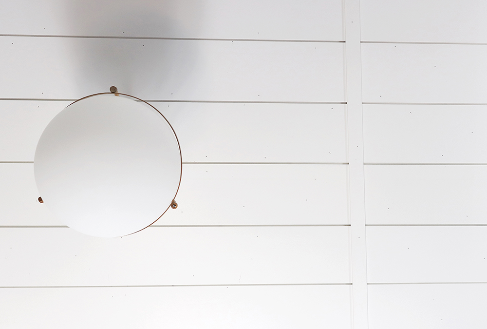 upward view of ceiling light and boards