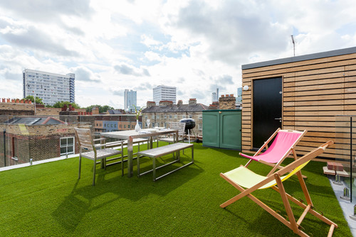 city rooftop patio with artificial grass