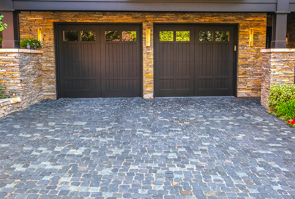 stone driveway double brown door driveway