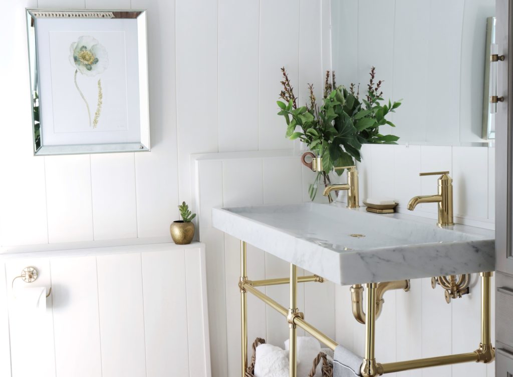 marble sink with gold finishes