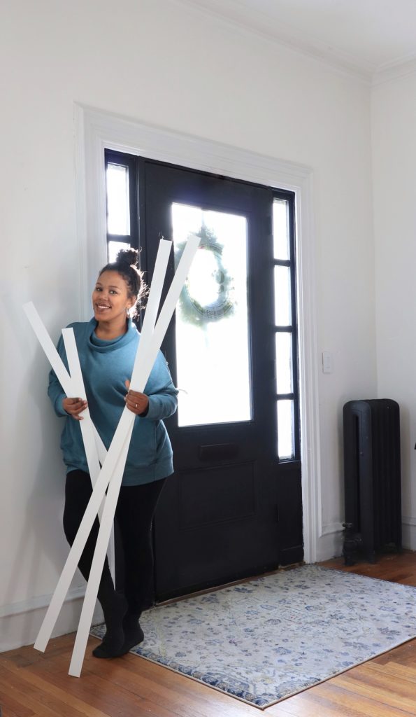 woman by house front door