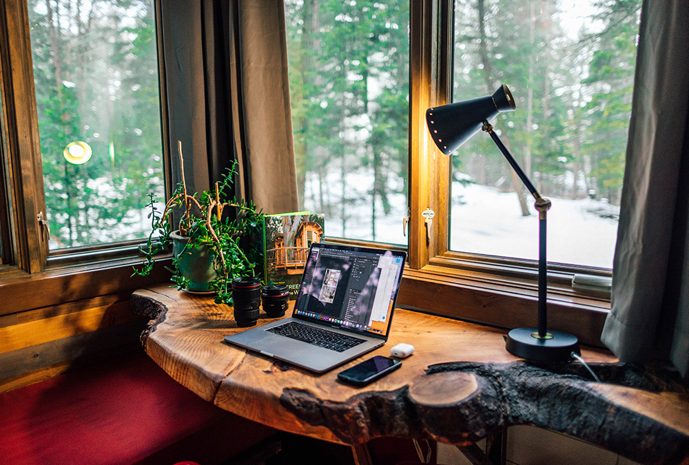 laptop on table with lamo