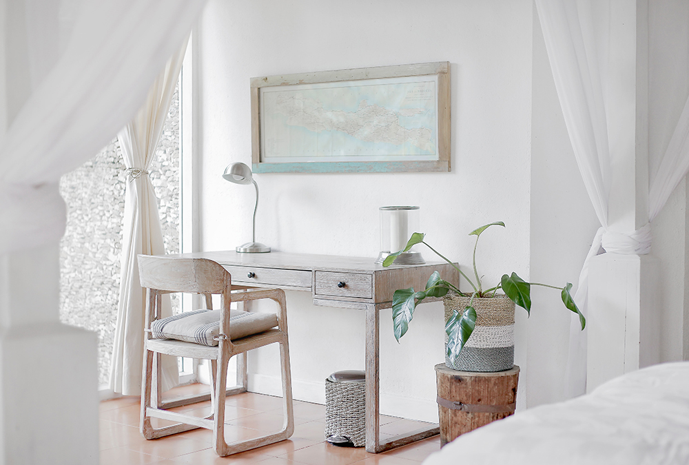 white home office with plant